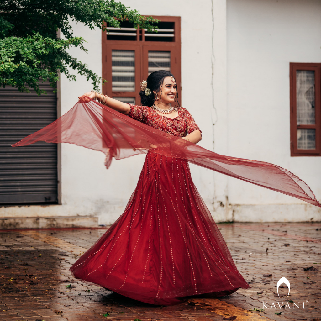 Our beautiful bride in her beautiful and elegant dark reddish lehenga with beautiful hand embroidery