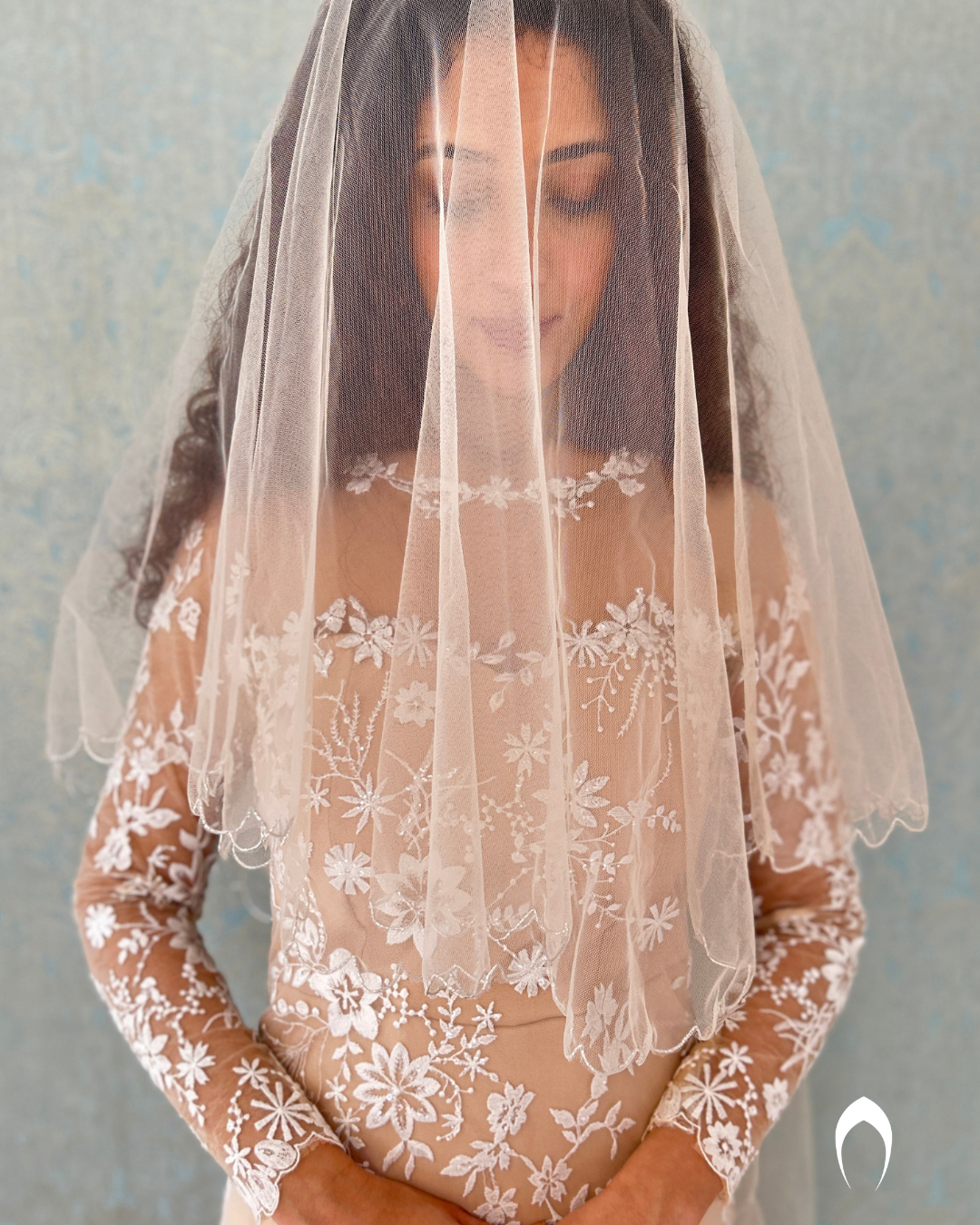 Signature bridal mermaid gown in champagne shade with floral lace embroidery