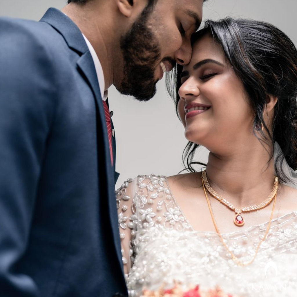 Our beautiful bride in her white bridal saree and elegant and stunning hand embroidery