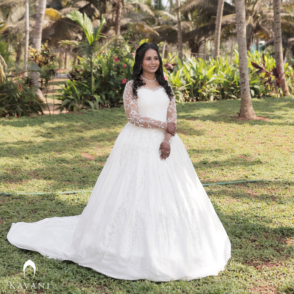 Signature bridal ball gown with lace and hand embroidery on silk fabric
