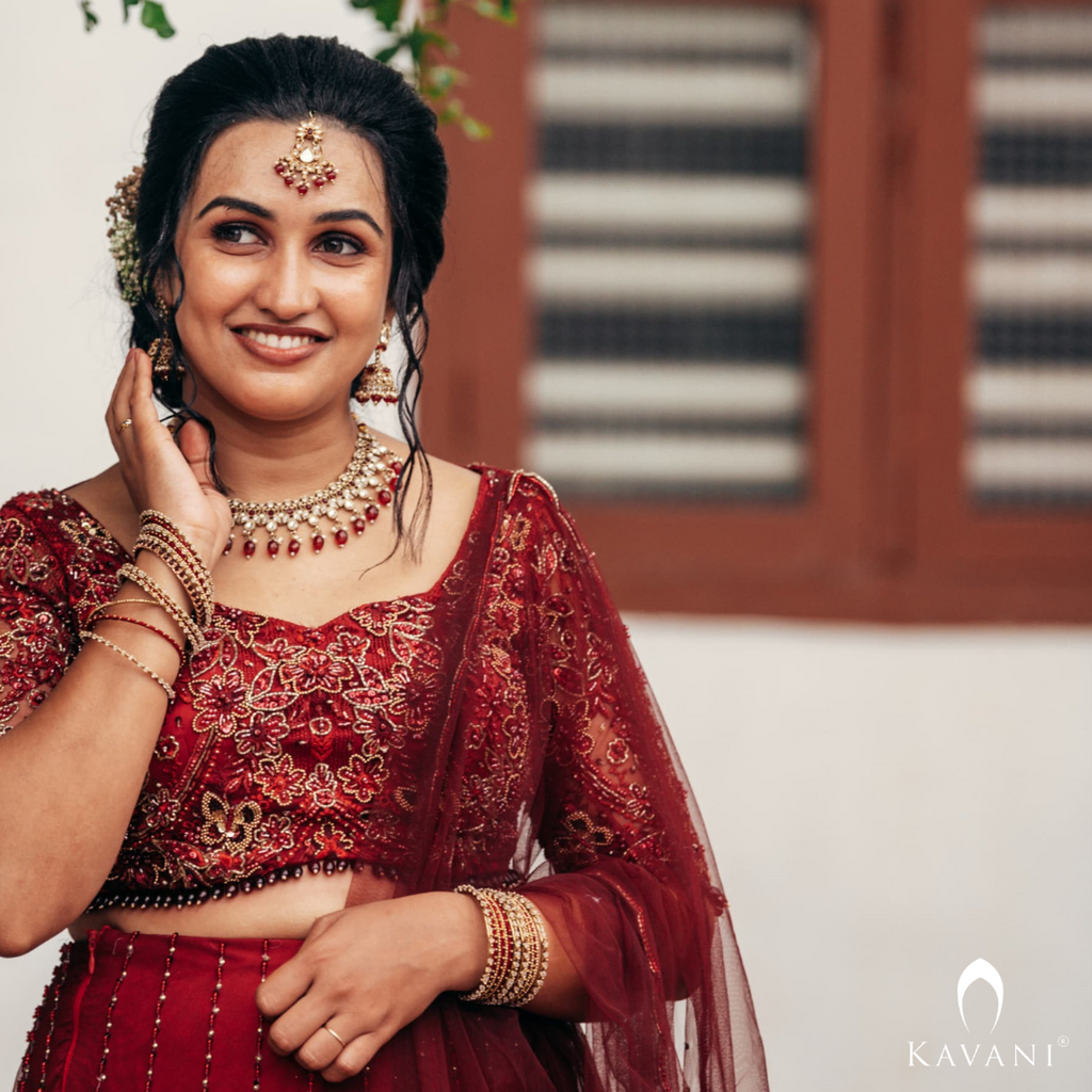 Our beautiful bride in her beautiful and elegant dark reddish lehenga with beautiful hand embroidery