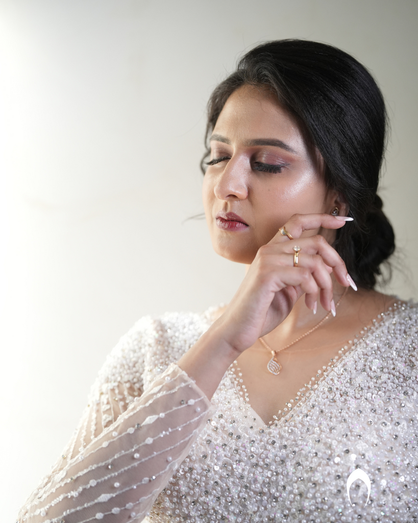 Signature christian bridal Aline gown featuring intricate handwork with beads and pearls