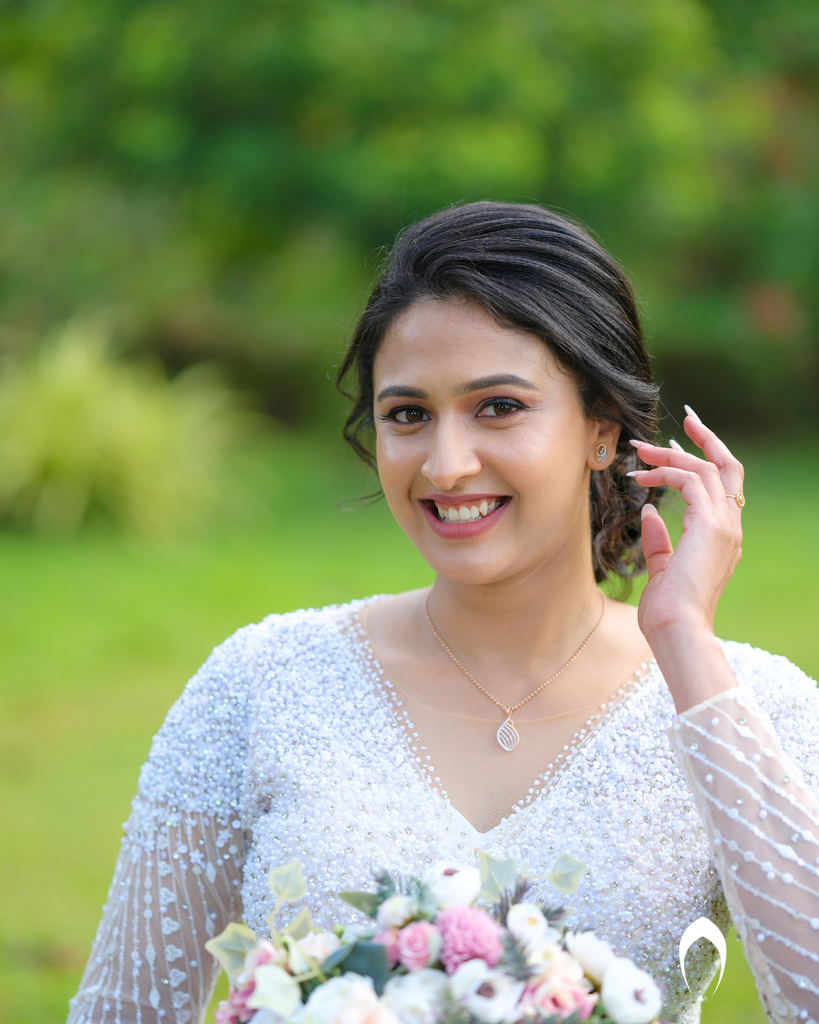 Signature christian bridal Aline gown featuring intricate handwork with beads and pearls