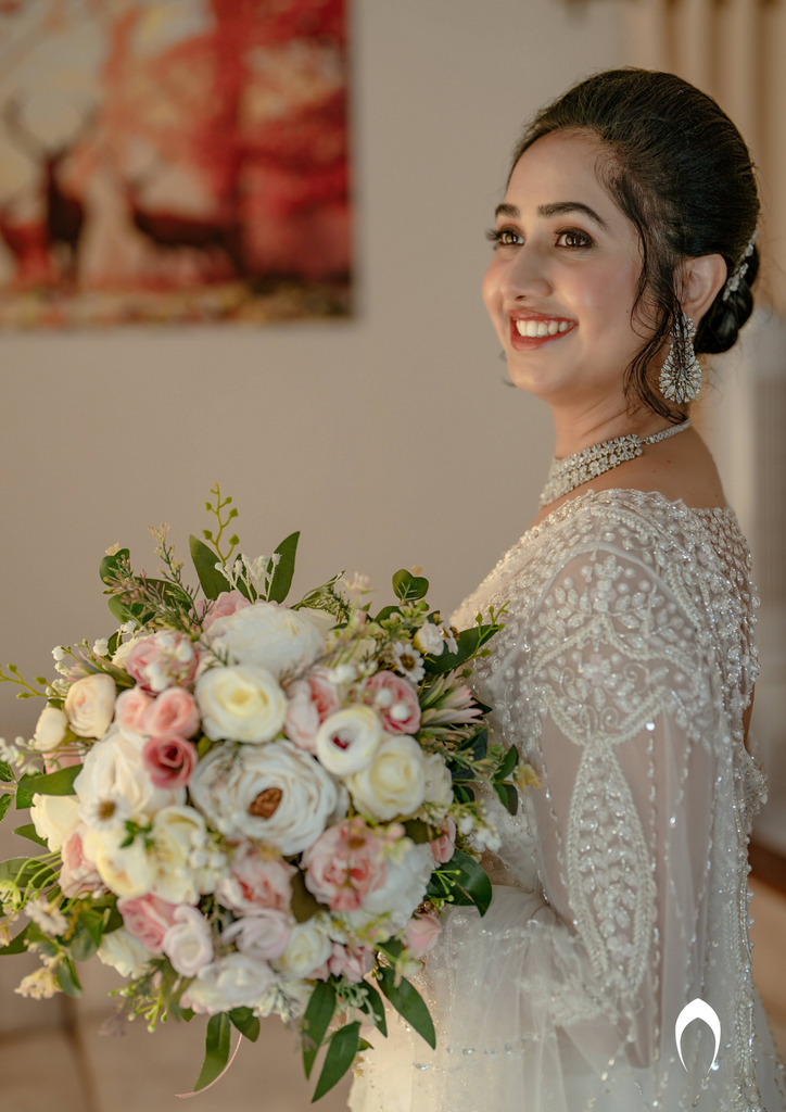 Signature Christian bridal off-white saree with heavy hand embroidery