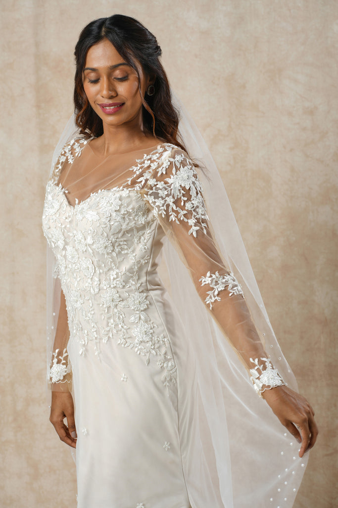 Embroidered Mermaid Gown with Floral Lace Appliqué, Full Sleeves & Long Trail