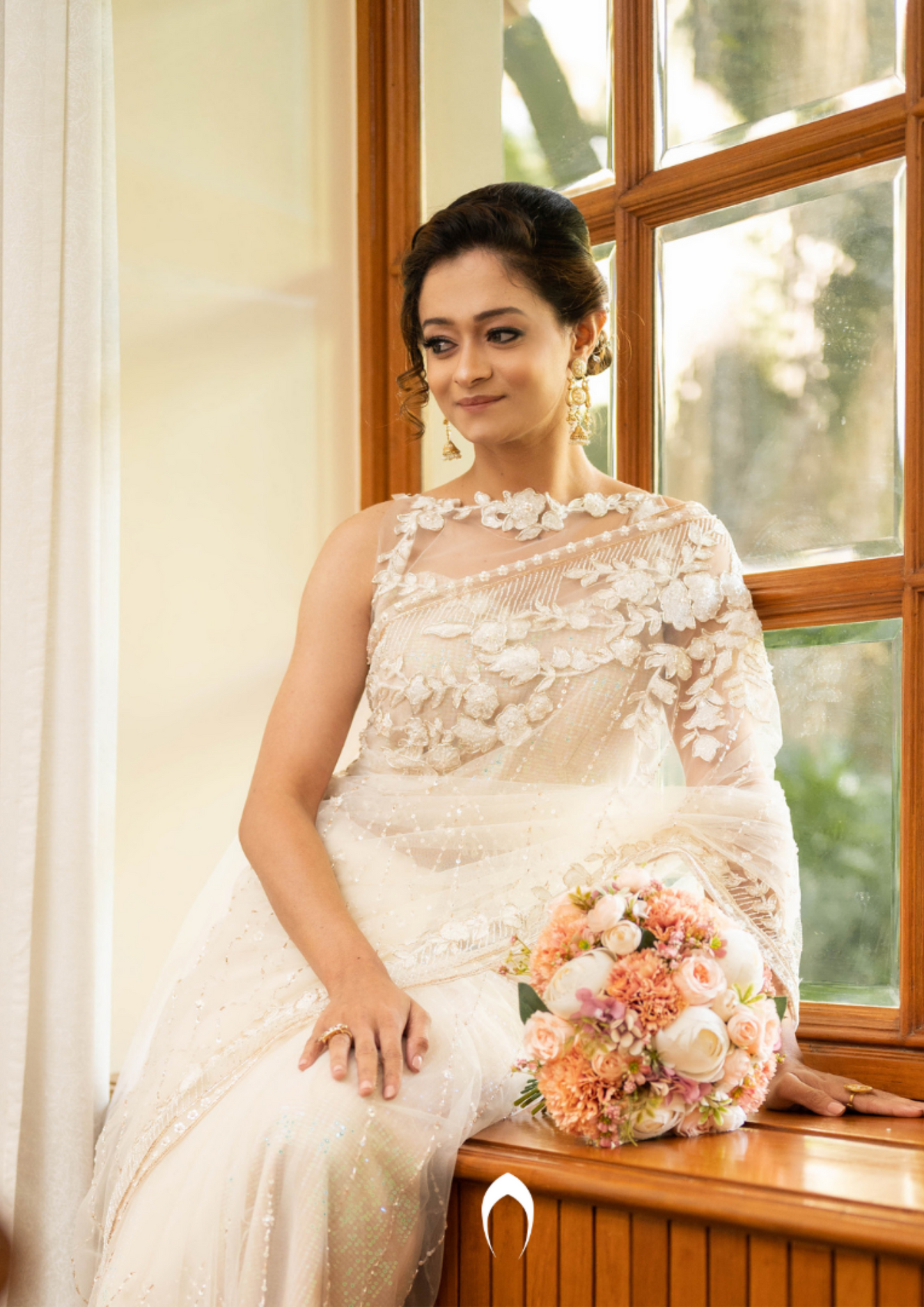 Signature christian bridal saree with intricate lace work and hand embroidery