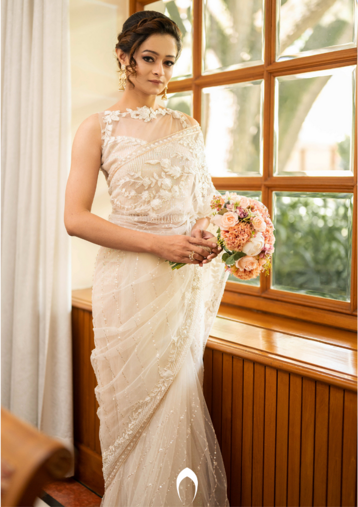 Signature christian bridal saree with intricate lace work and hand embroidery
