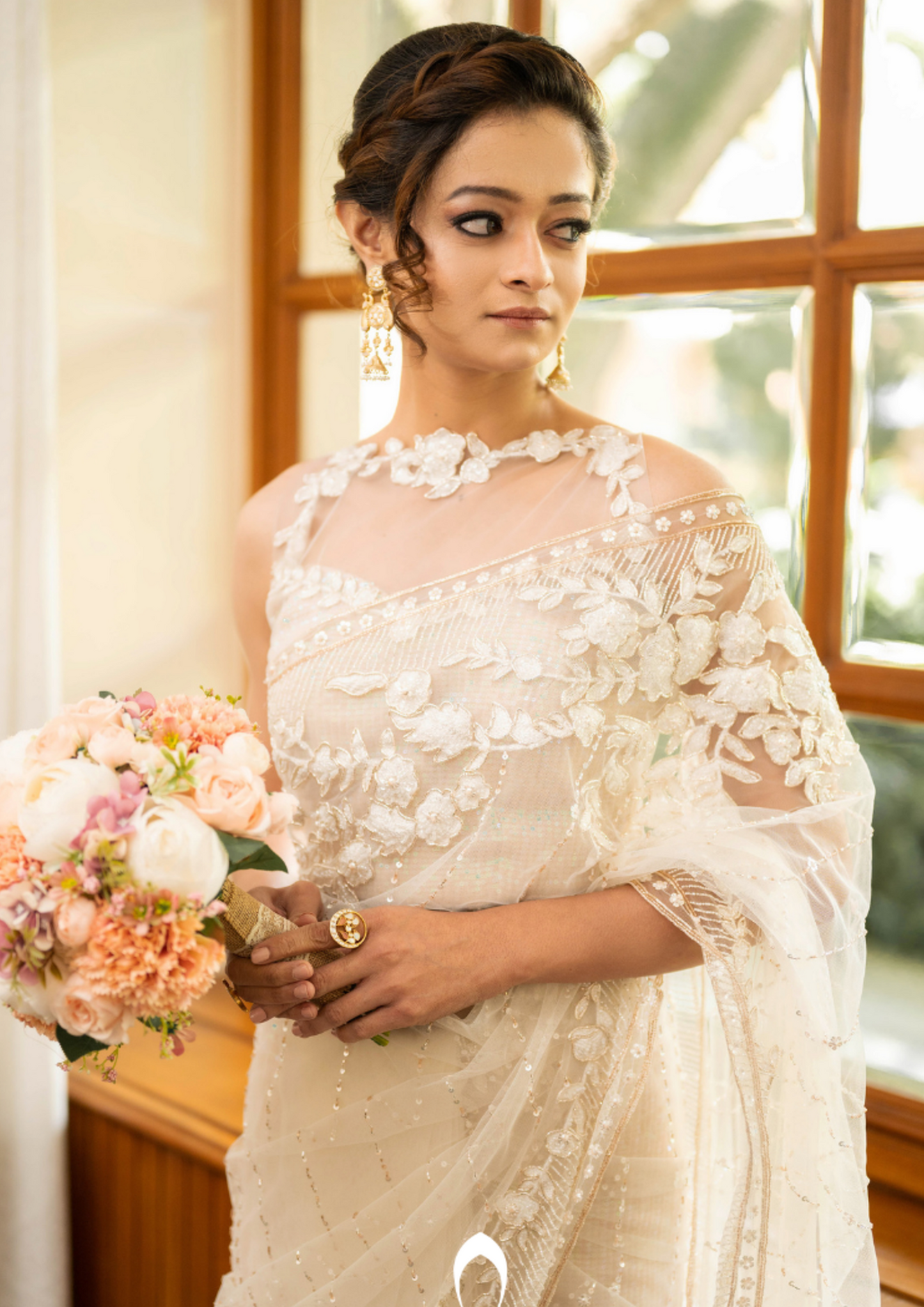 Signature christian bridal saree with intricate lace work and hand embroidery