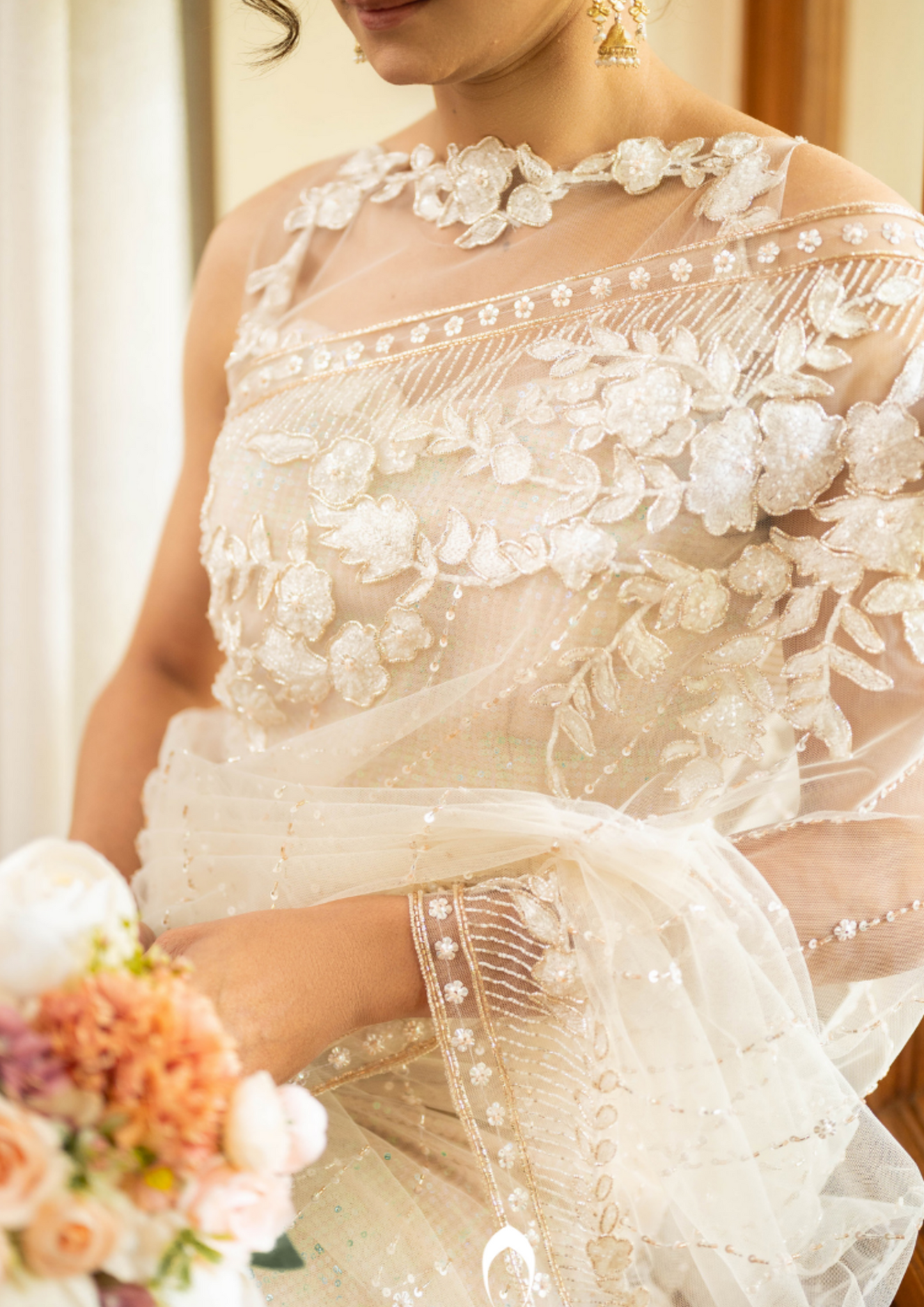 Signature christian bridal saree with intricate lace work and hand embroidery