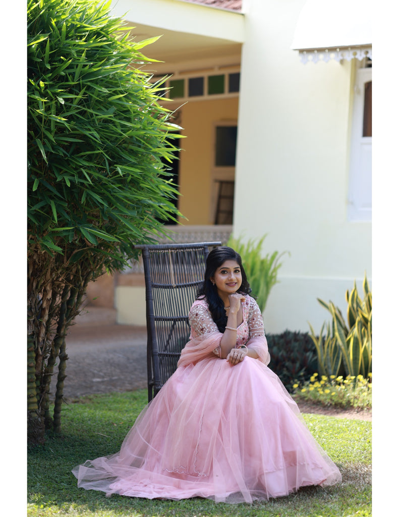 Signature bridal pink net lehanga with hand worked blouse