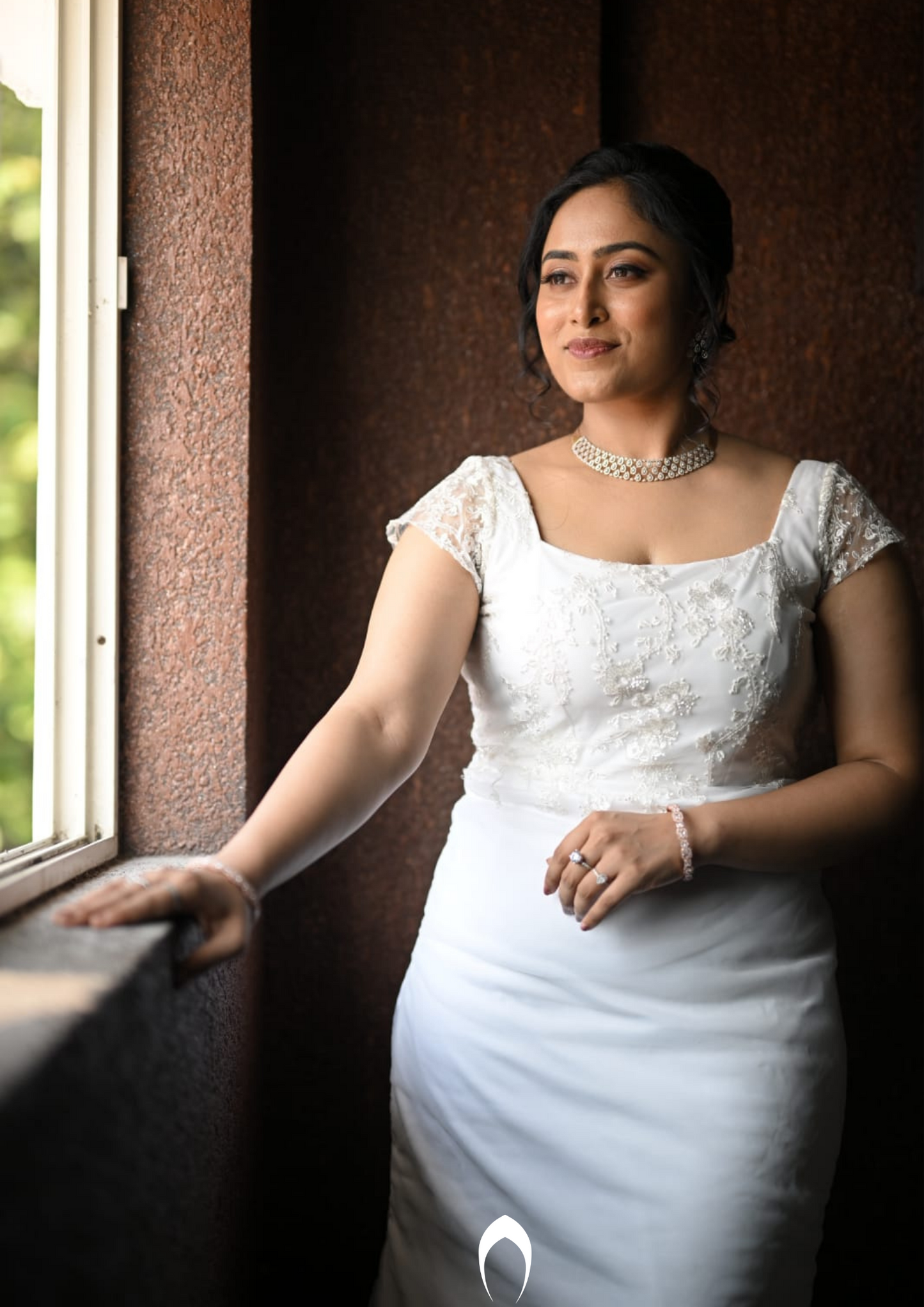 Signature Christian bridal fitted gown carried by bride Ashwathi