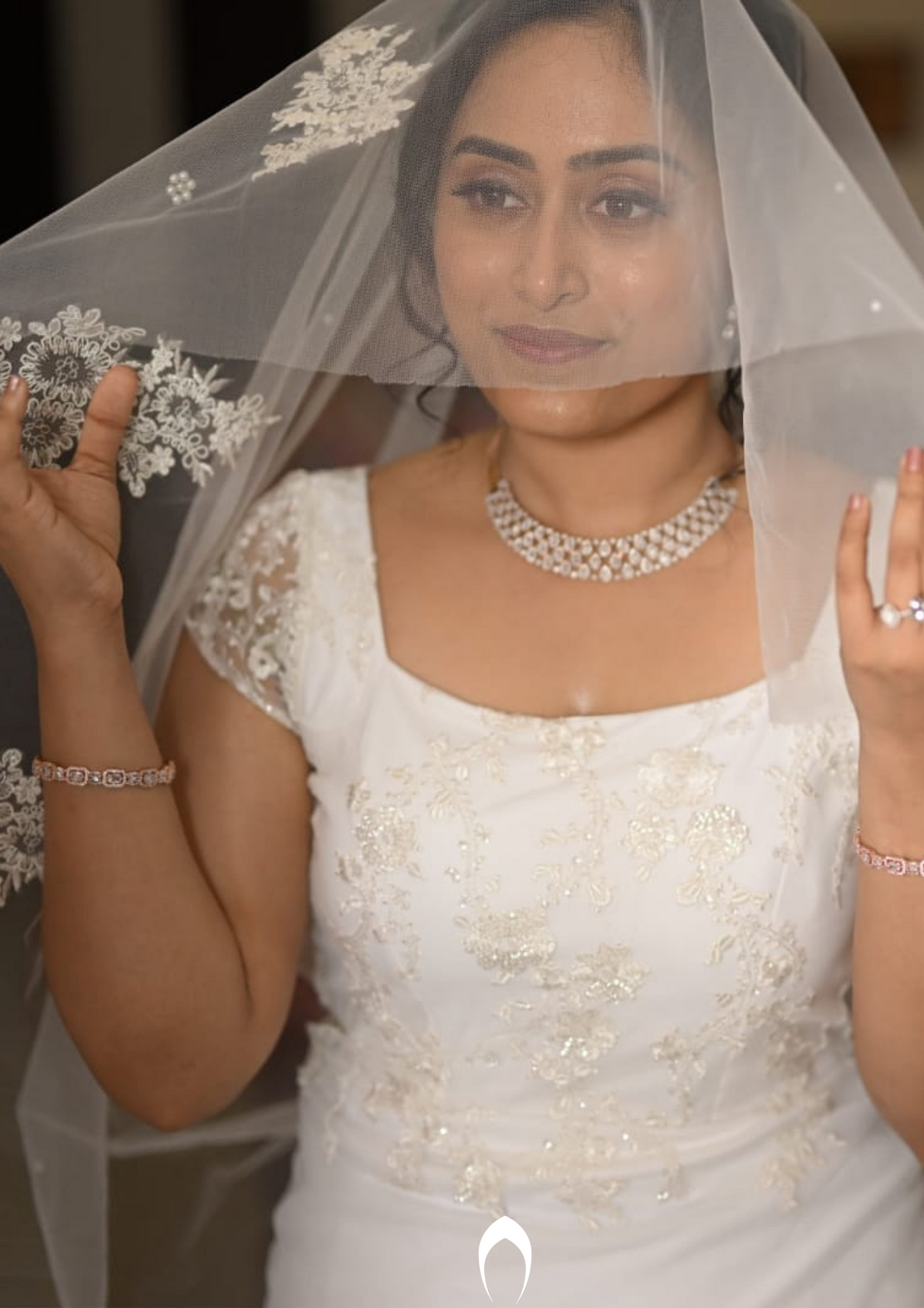 Signature Christian bridal fitted gown carried by bride Ashwathi
