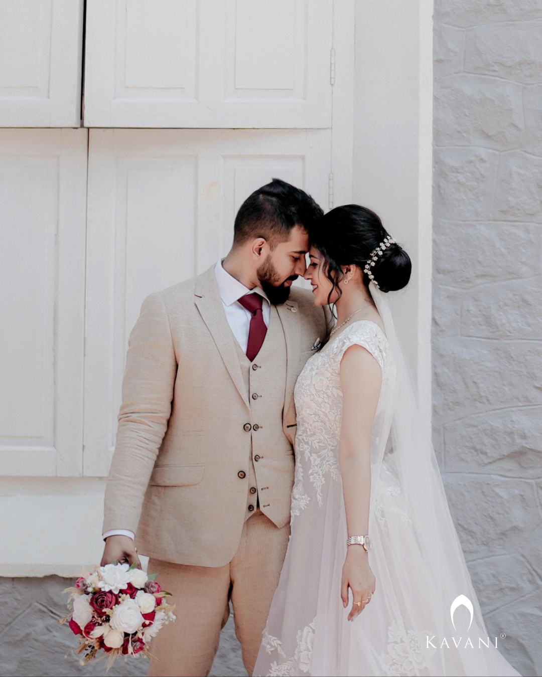 Signature Aline gown in organza  fabric with applique over a champagne beige shimmer fabric