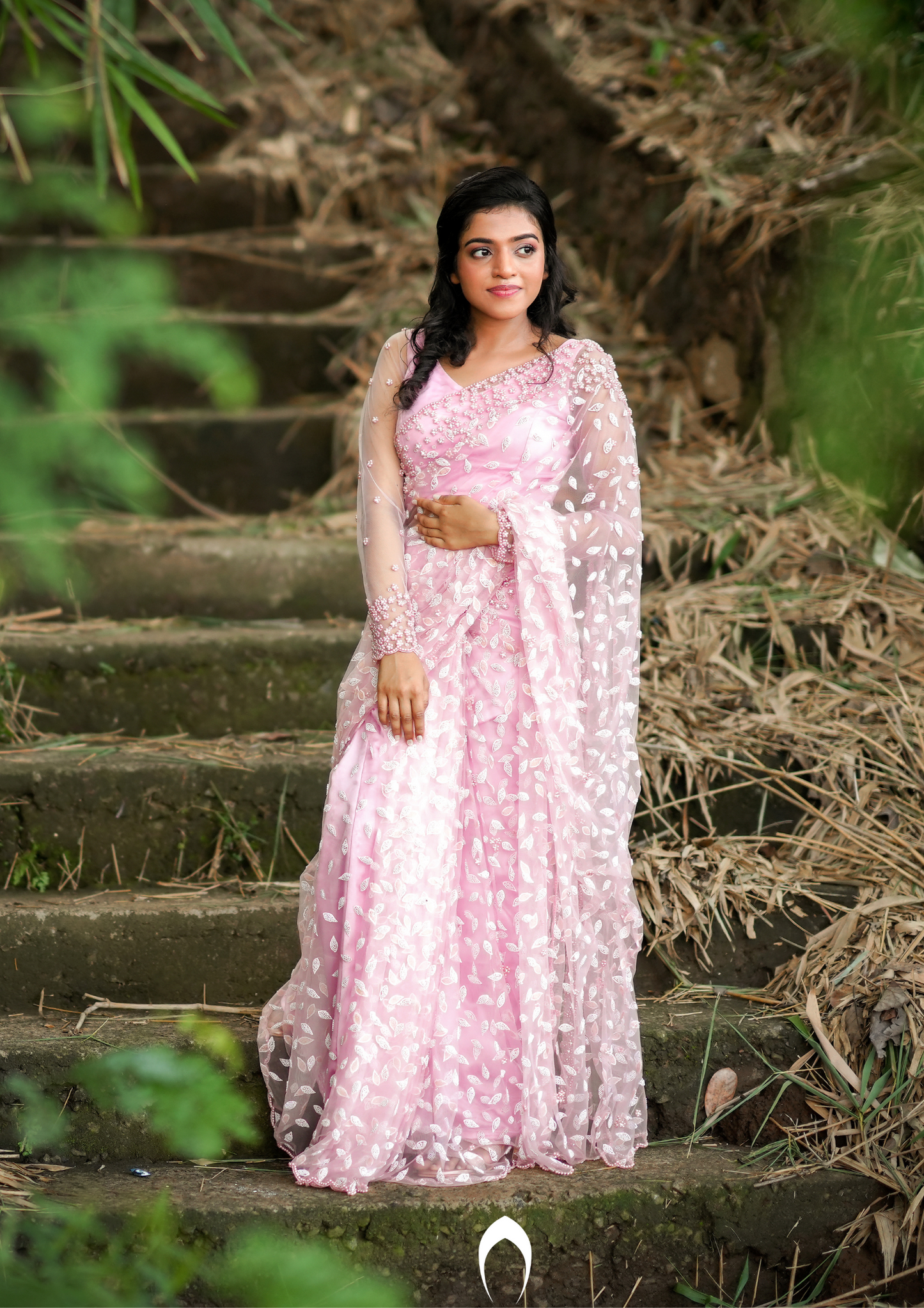 Signature Christian bridal saree in pink embellished net