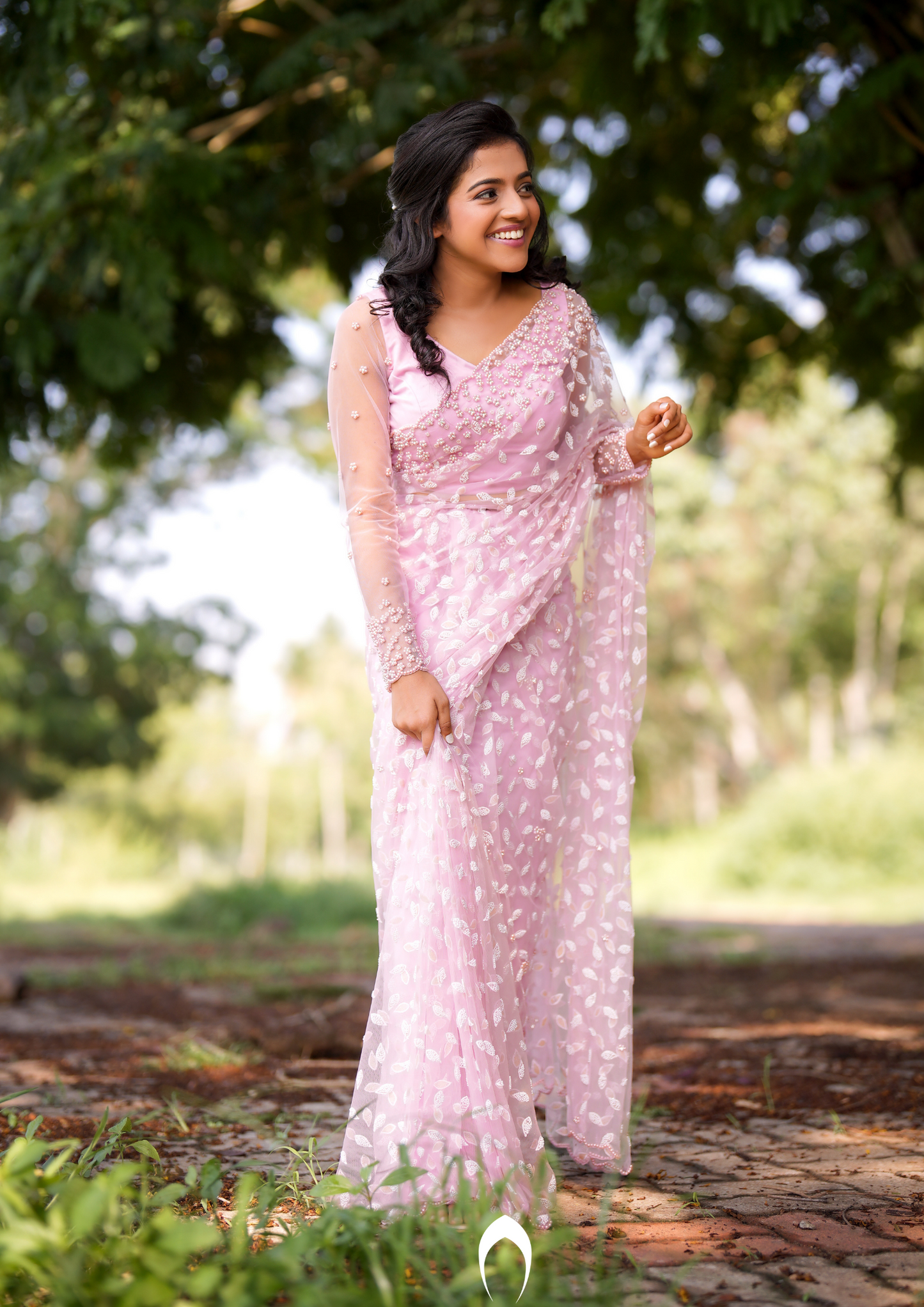 Signature Christian bridal saree in pink embellished net