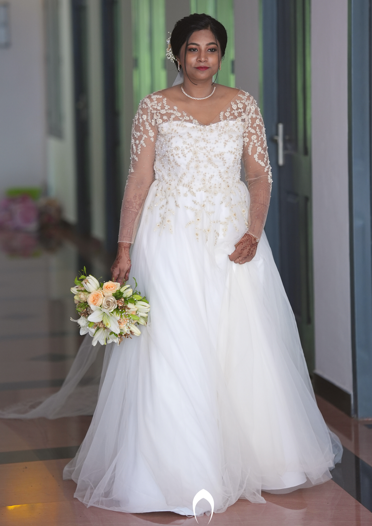 Signature Christian bridal A-line gown caried by bride Supriya