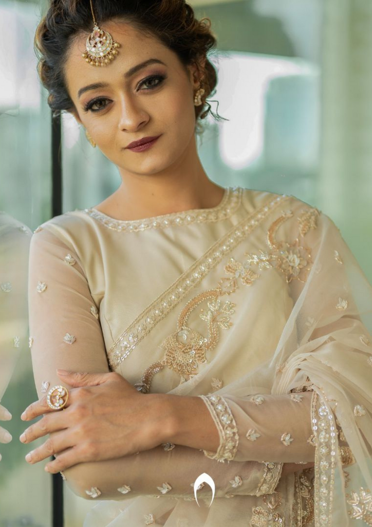 Signature Christian bridal saree in rosegold with heavy hand embroidery