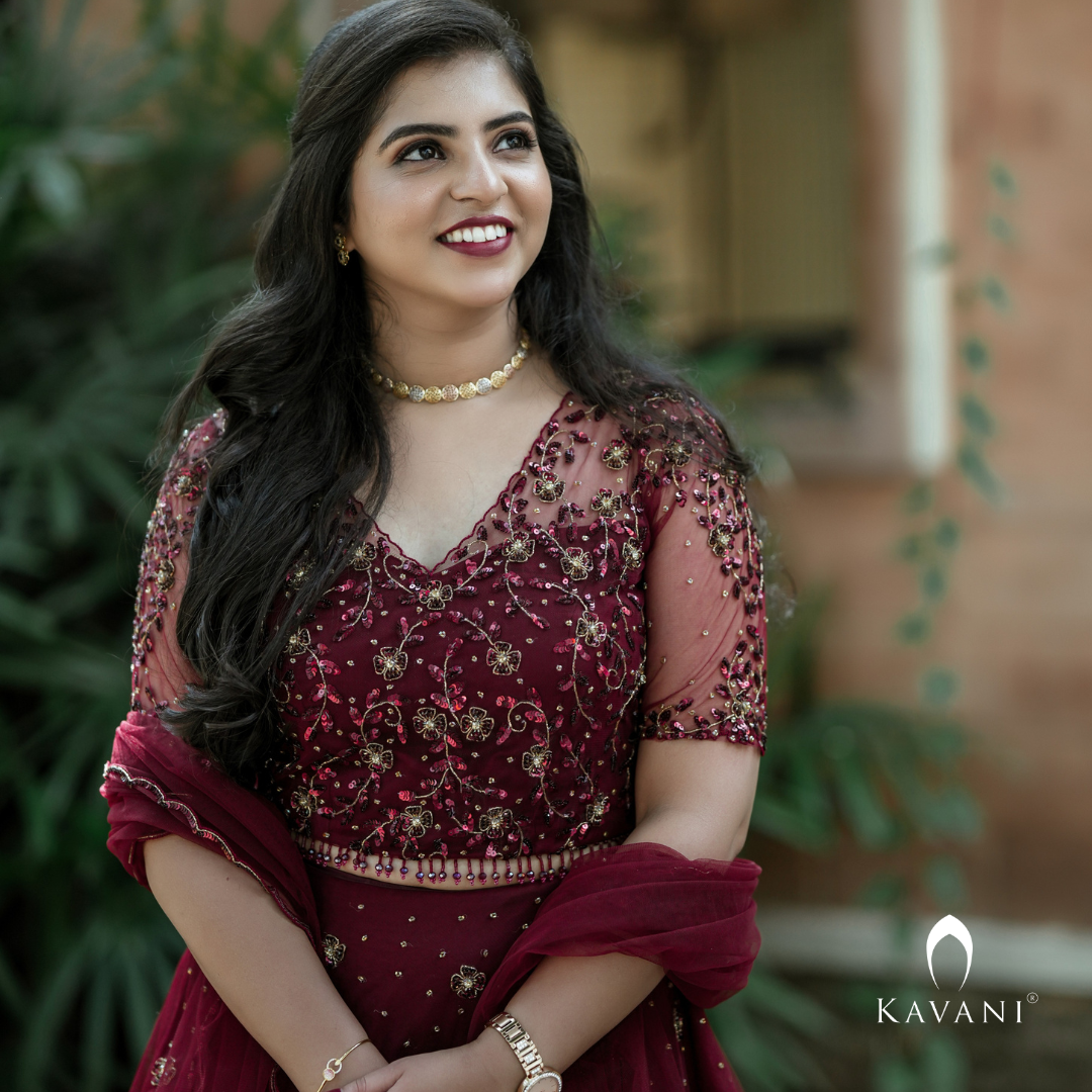 Our beautiful bride in stunning in this exclusive hand embroidered lehenga in deep red shade