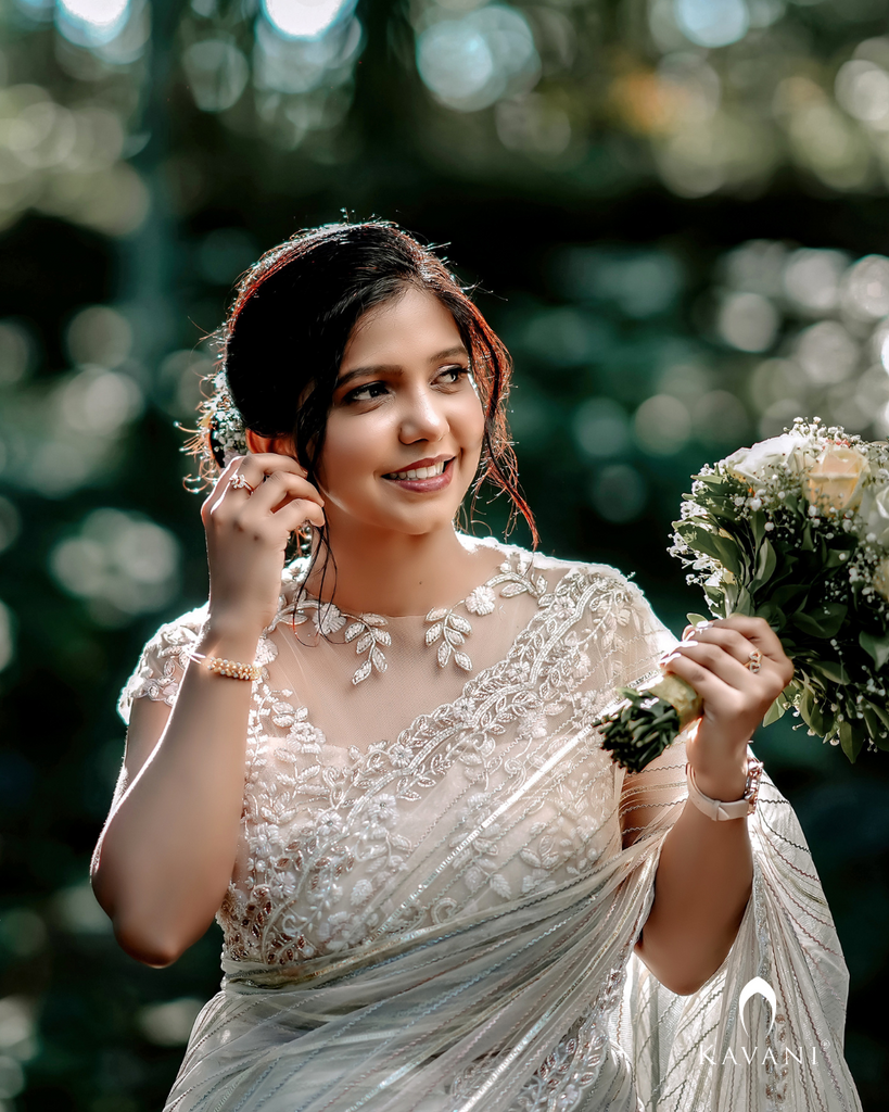 Signature White organza saree with floral hand embroidered design blouse