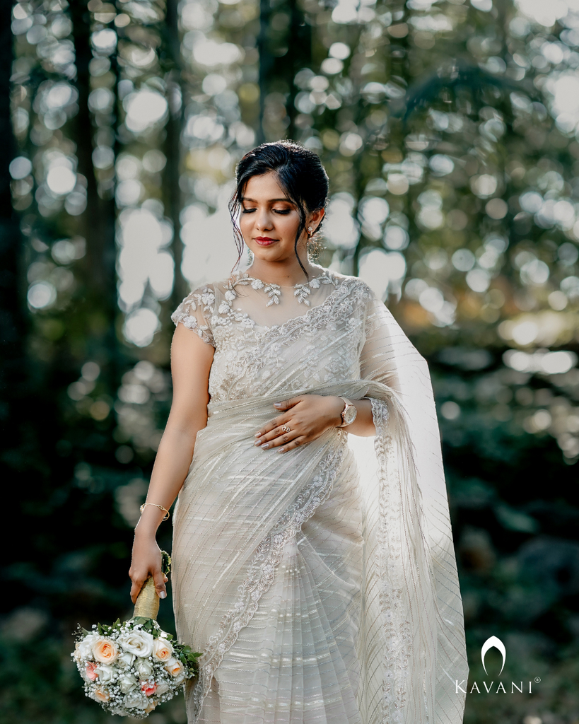 Signature White organza saree with floral hand embroidered design blouse