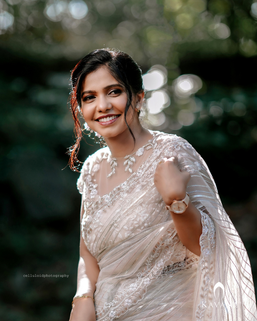 Signature White organza saree with floral hand embroidered design blouse