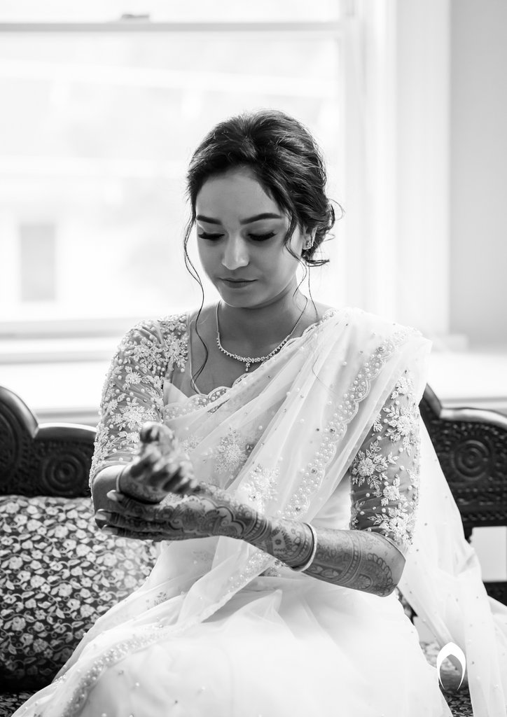 Signature Christian bridal saree with intricately worked heavy trailing pallu