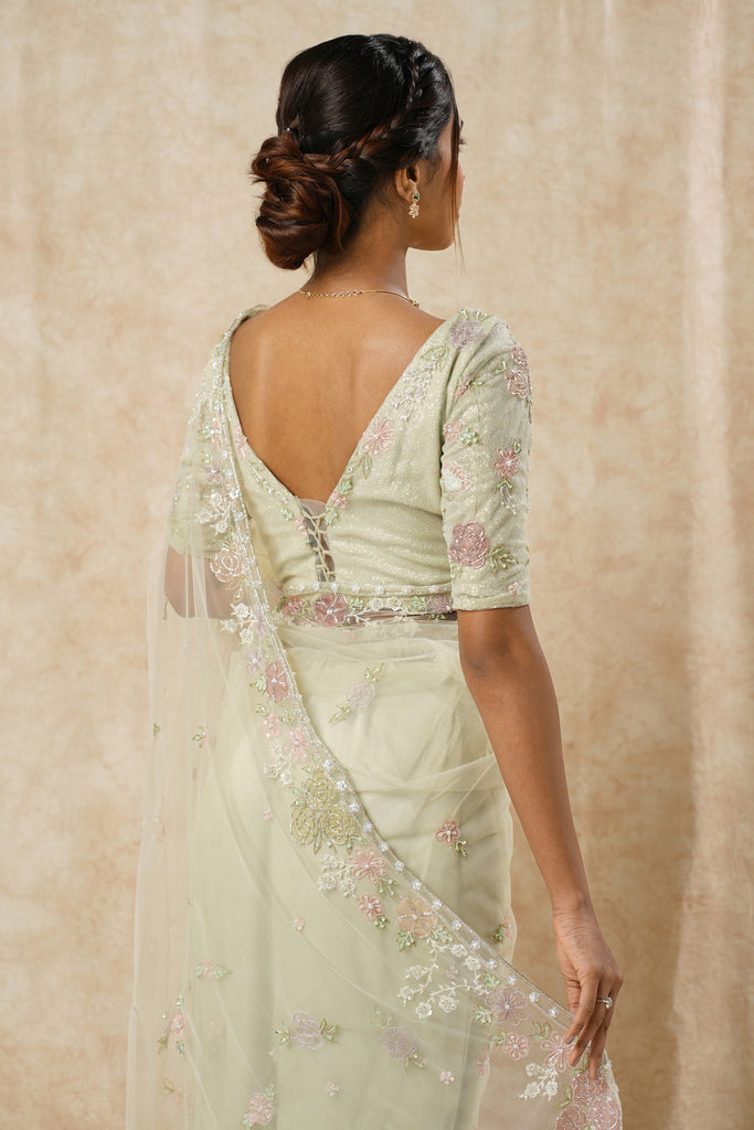 Enchanting Sage Green Net Saree with Multicolor Floral Appliqué & Beaded Detailing