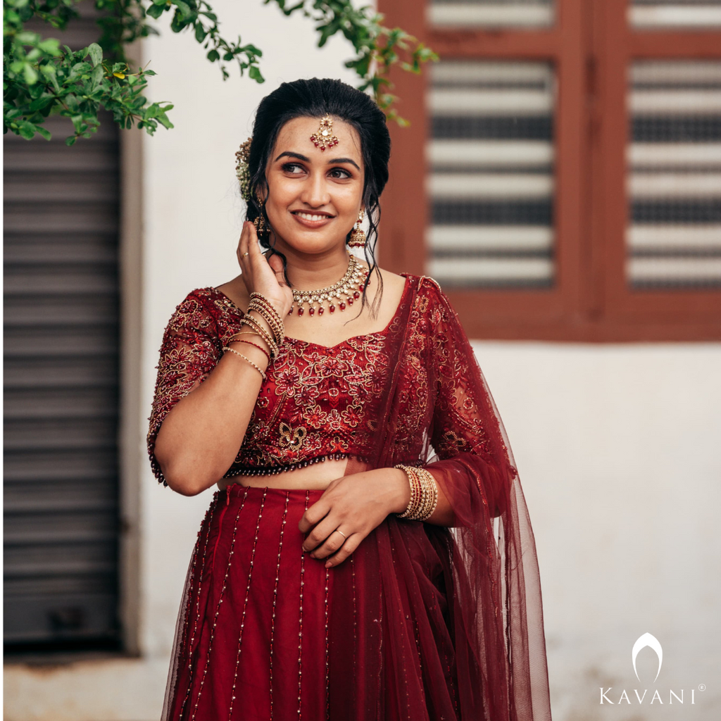 Our beautiful bride in her beautiful and elegant dark reddish lehenga with beautiful hand embroidery