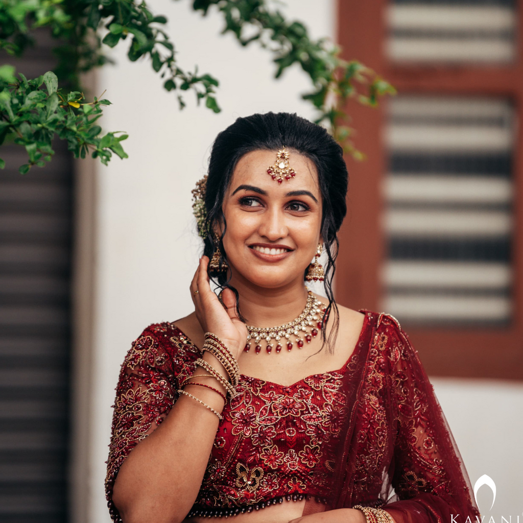 Our beautiful bride in her beautiful and elegant dark reddish lehenga with beautiful hand embroidery