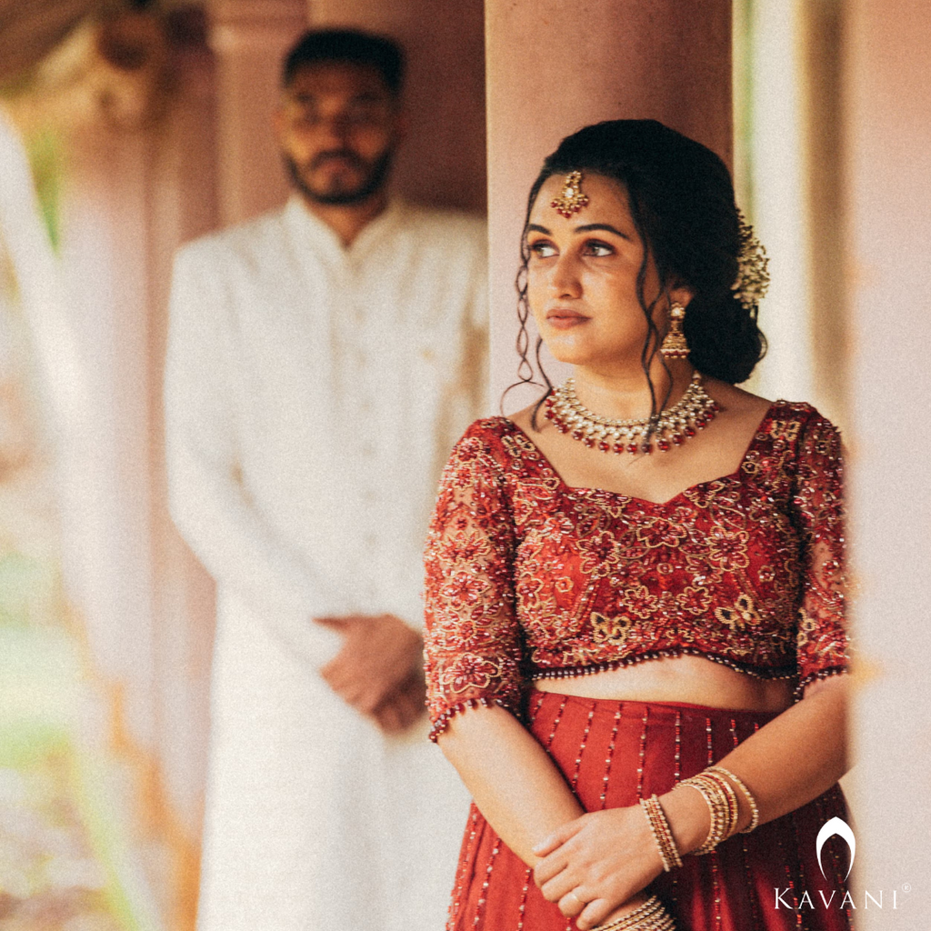 Our beautiful bride in her beautiful and elegant dark reddish lehenga with beautiful hand embroidery