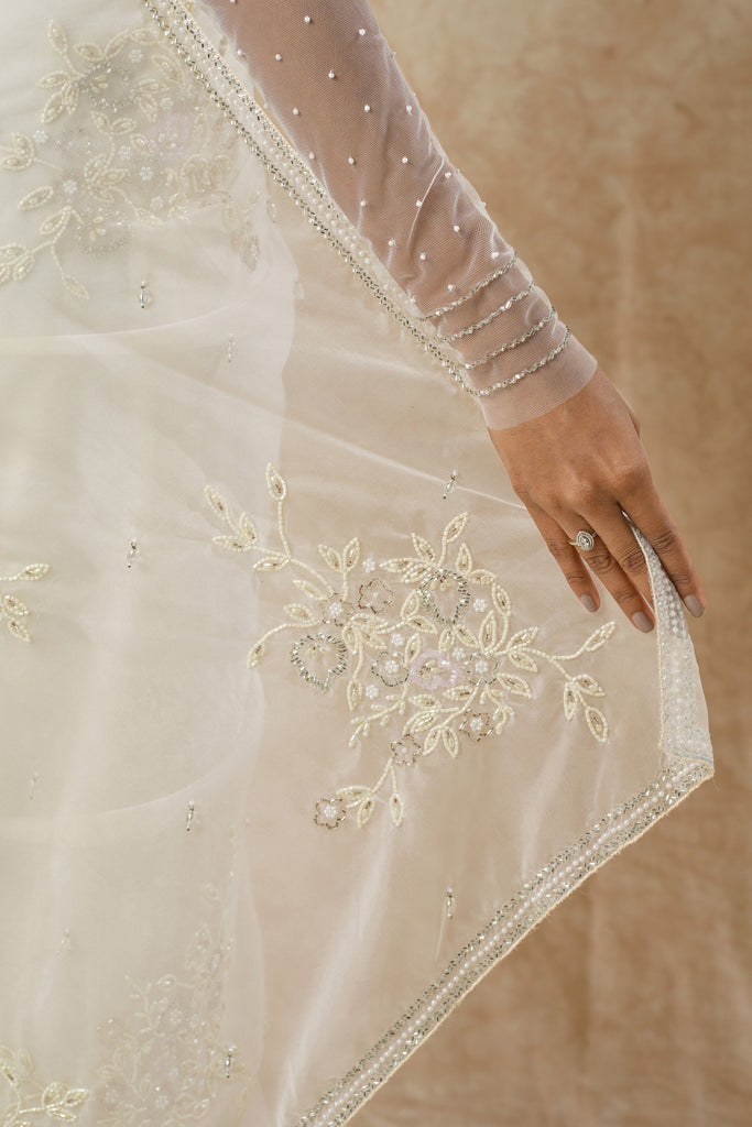 Off-White Net Saree with Leaf & Flower Detailing