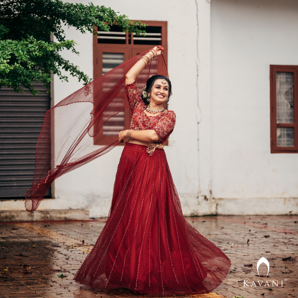 Our beautiful bride in her beautiful and elegant dark reddish lehenga with beautiful hand embroidery