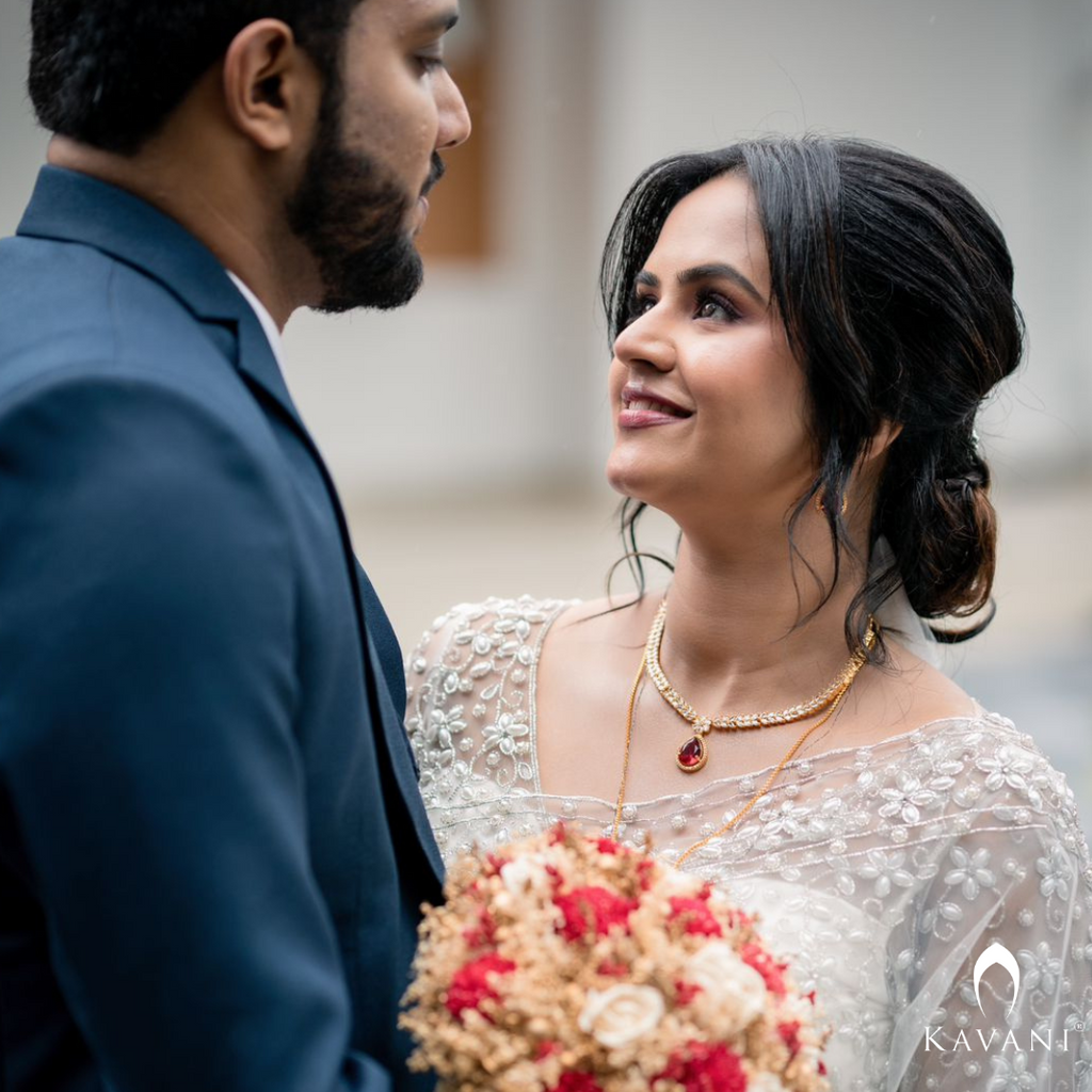 Our beautiful bride in her white bridal saree and elegant and stunning hand embroidery