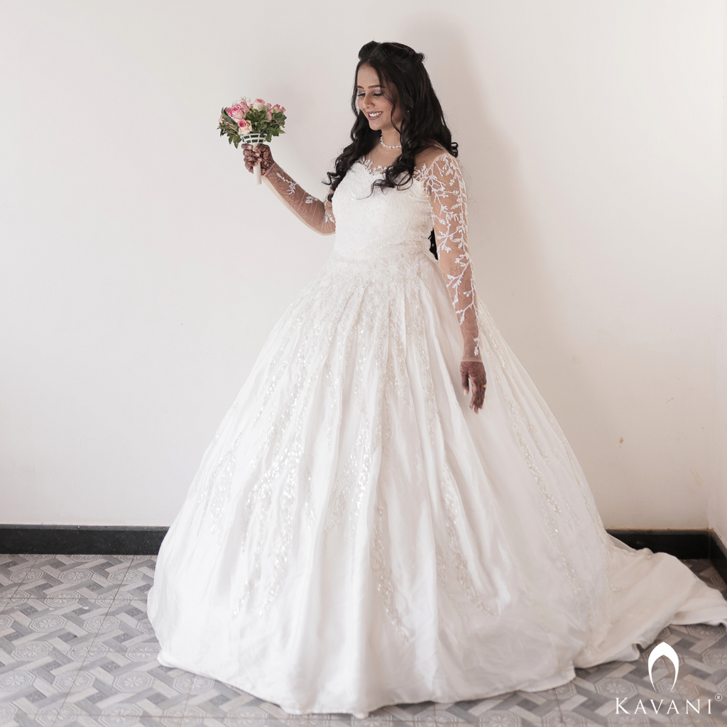 Signature bridal ball gown with lace and hand embroidery on silk fabric