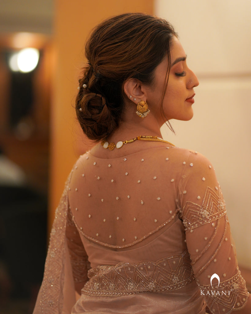 Signature Rose gold tissue saree with stylished pattern blouse