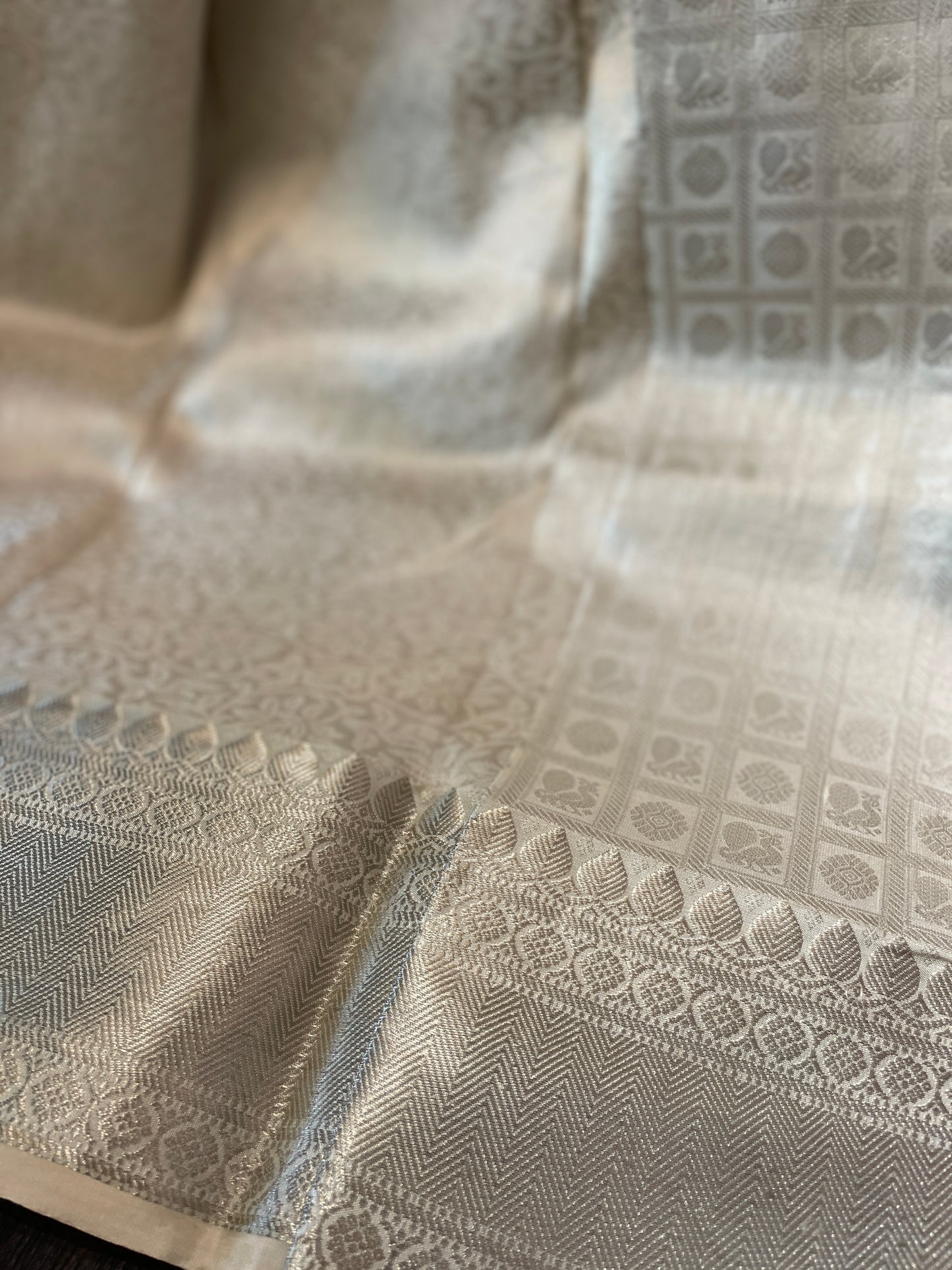 Signature bridal White Kanjivaram Saree with Silver Weaving