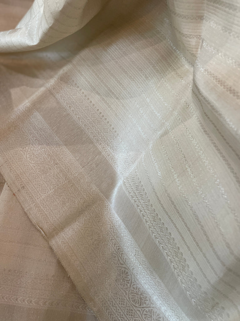 Signature bridal kanjivaram saree in subtle silver tone