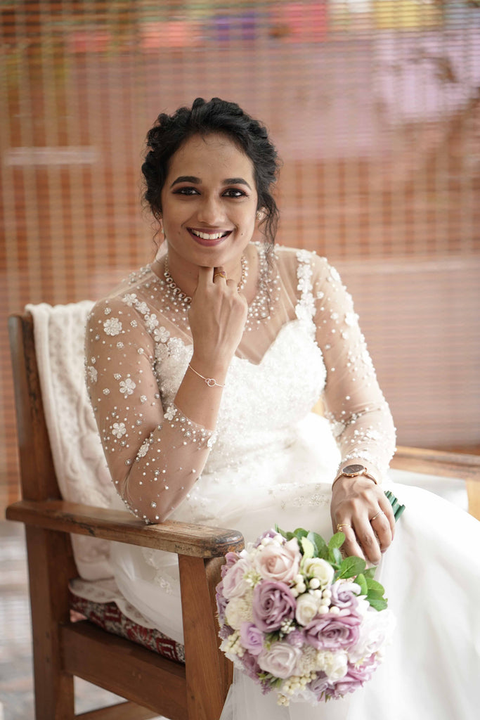 Signature bridal Aline gown with floral hand work with beadsand pearls