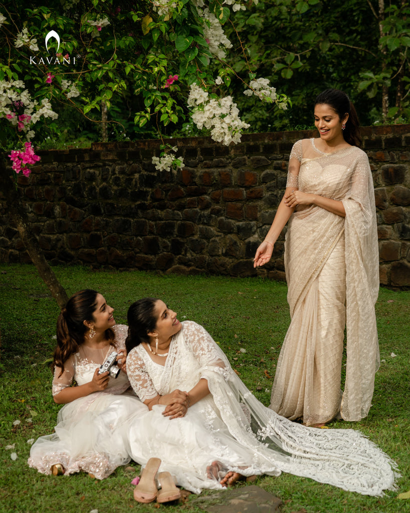 Our signature bridal saree in a light gold shade with beautiful lines of hand embroidery