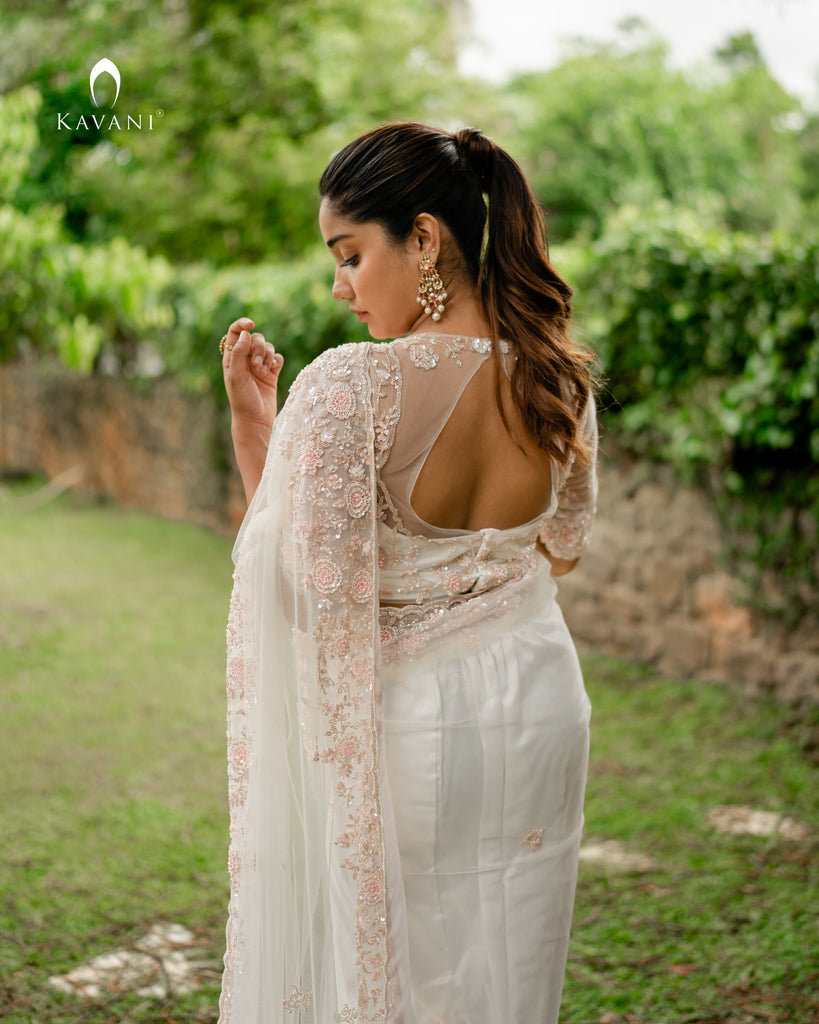 Our signature design white bridal saree with beautiful hand embroidery