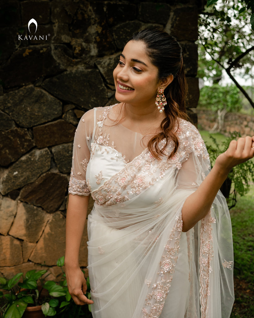Our signature design white bridal saree with beautiful hand embroidery