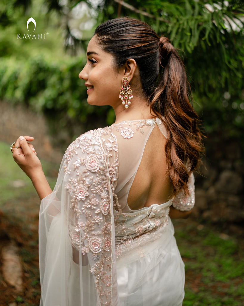 Our signature design white bridal saree with beautiful hand embroidery