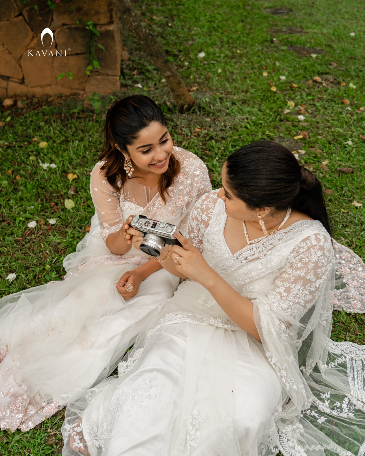 Our signature stunning white bridal saree showing beautiful lace embroidery with embellishments