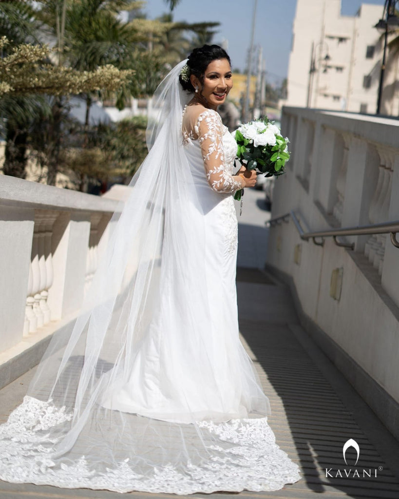 Our pretty bride in her stunning outlook in her mermaid gown with beautiful lace embroidery