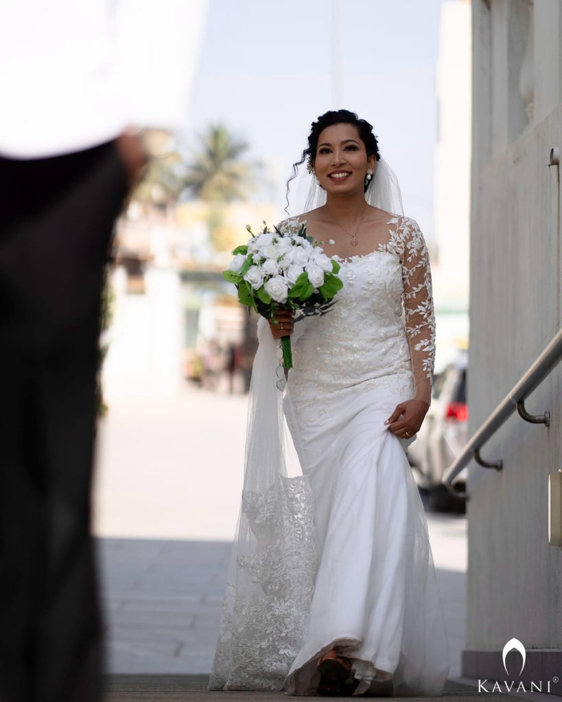 Our pretty bride in her stunning outlook in her mermaid gown with beautiful lace embroidery