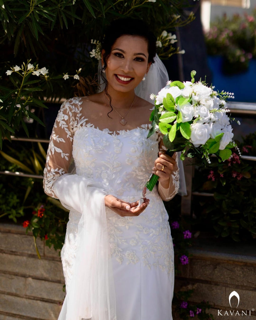 Our pretty bride in her stunning outlook in her mermaid gown with beautiful lace embroidery