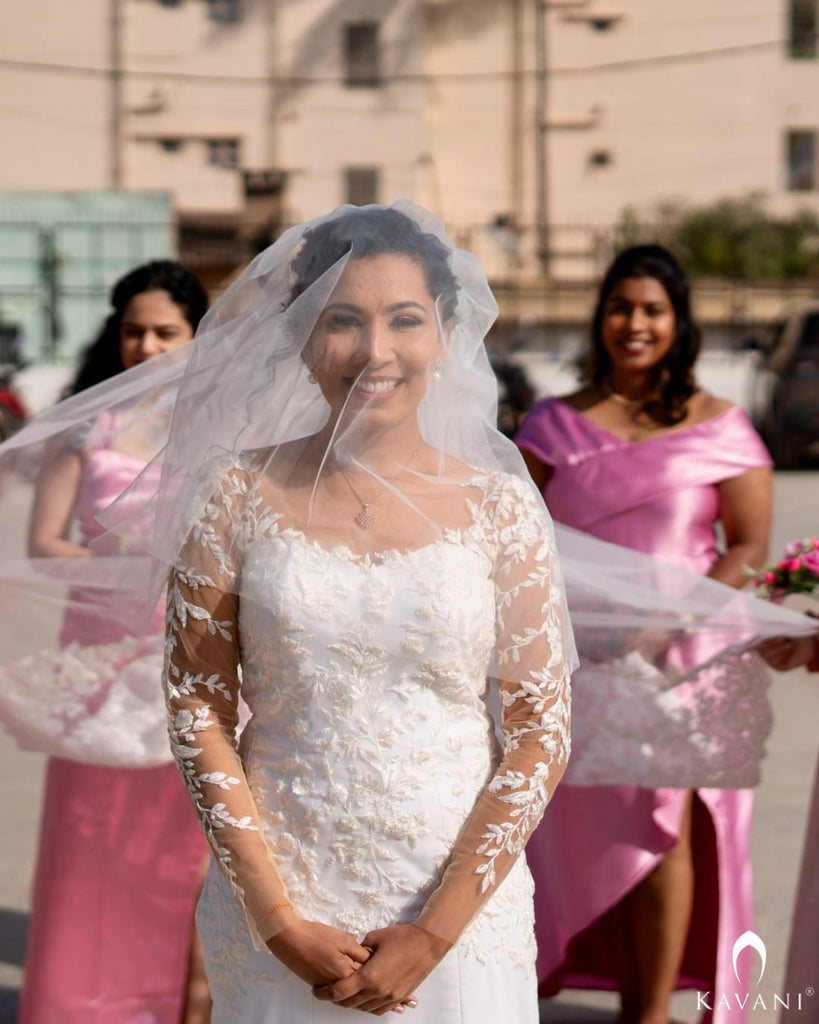 Our pretty bride in her stunning outlook in her mermaid gown with beautiful lace embroidery
