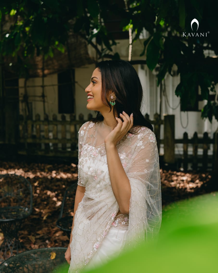 Our signature designer white bridal saree with beautiful hand embroidery
