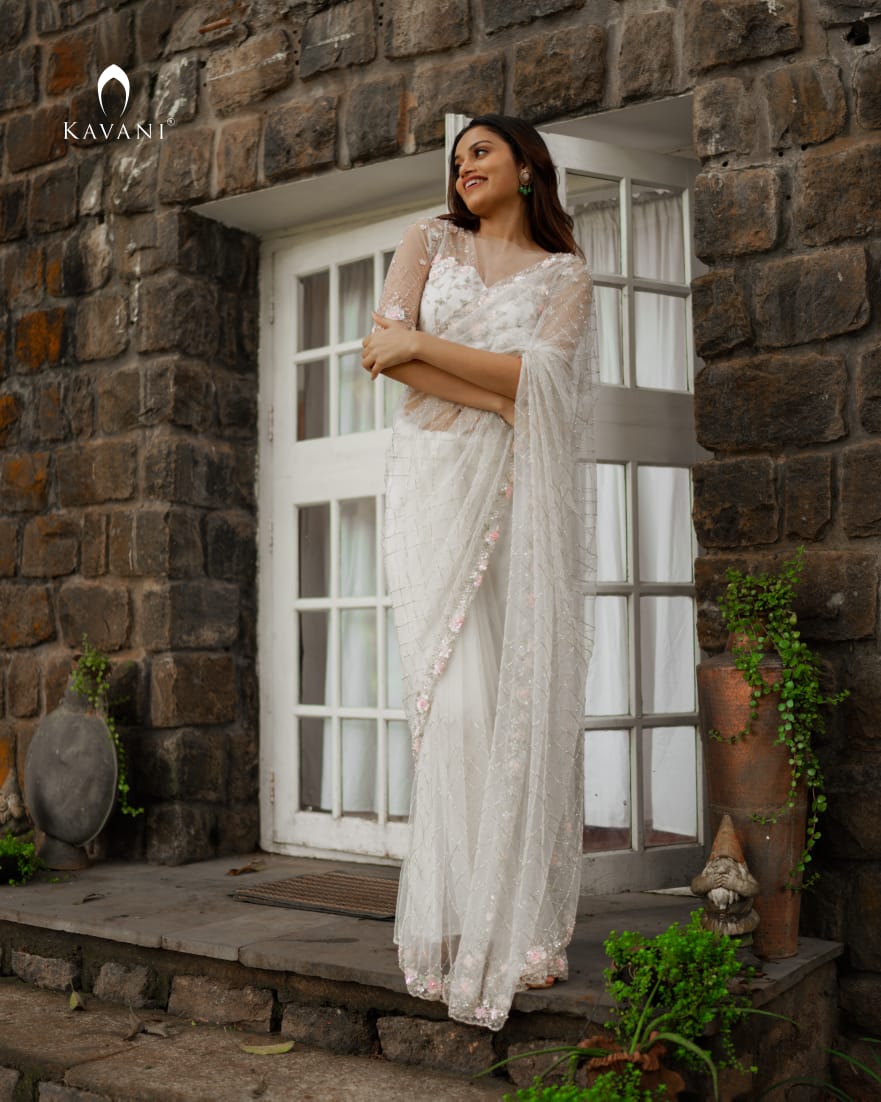 Our signature designer white bridal saree with beautiful hand embroidery