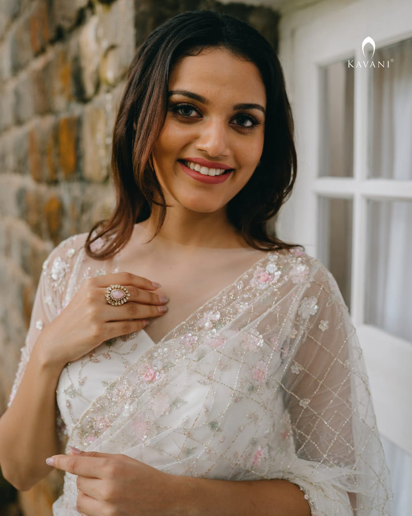 Our signature designer white bridal saree with beautiful hand embroidery